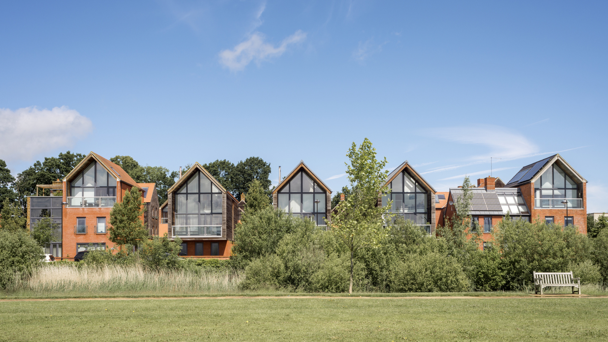 View of sustainable residential design Upton Site C, its soft green edge to the development